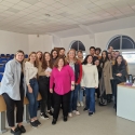 Dr. Melissa Camacho poses with students in Romania