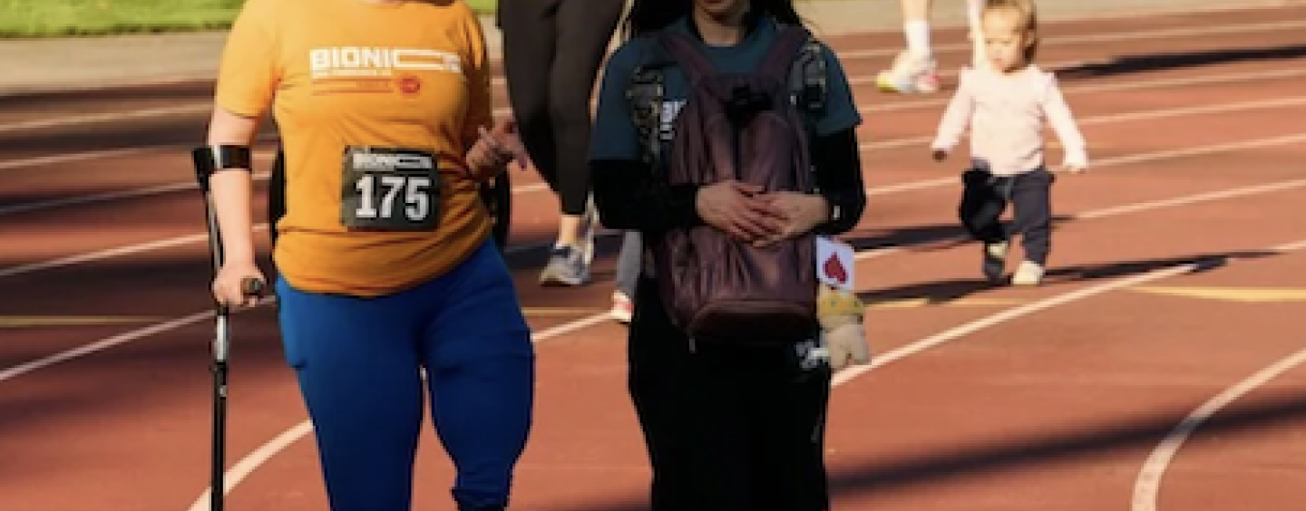 Bella Mayer and friend walking the bionic mile