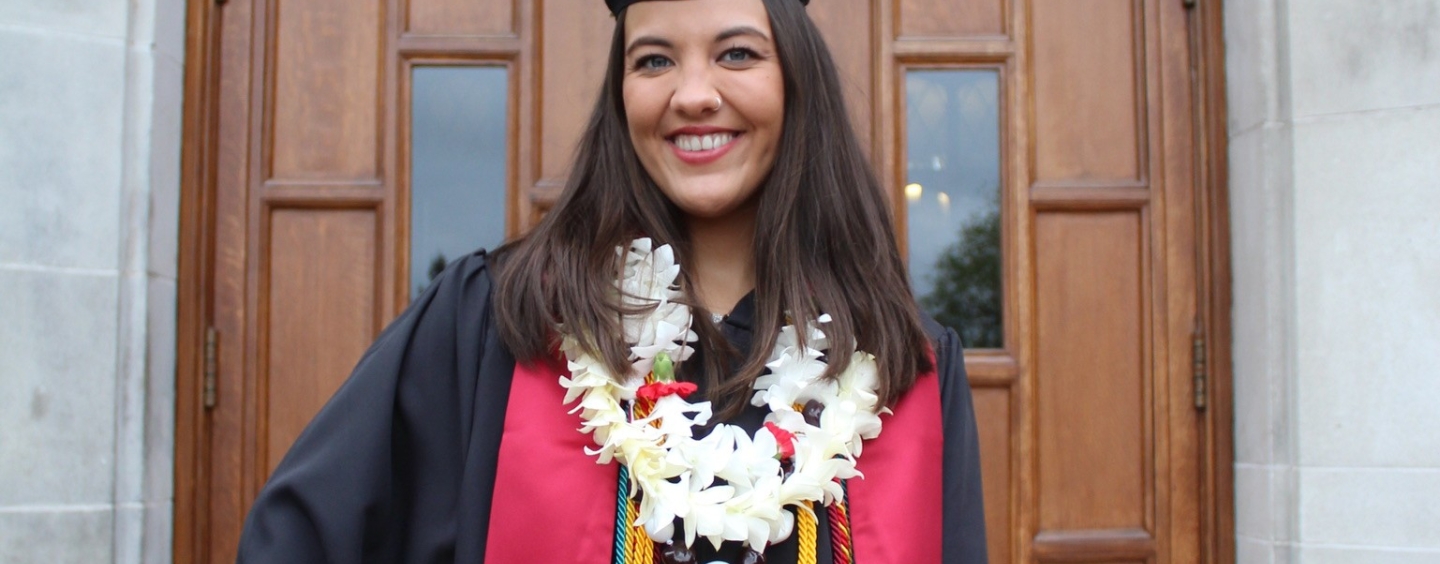 Natalie Wilson poses with cap and gown