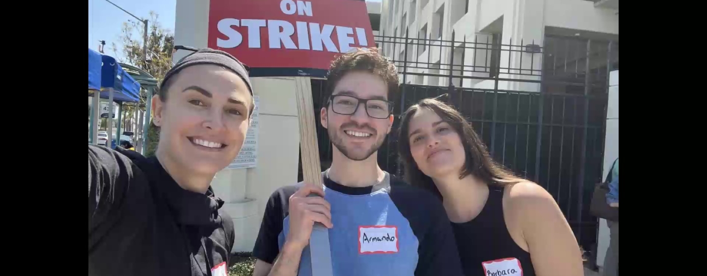 BECA faculty member Marion Dayre and BECA alumni (Armando Jimenez ‘22 and Barbara Burgues BECA ‘21) on the Writers Guild picket line.